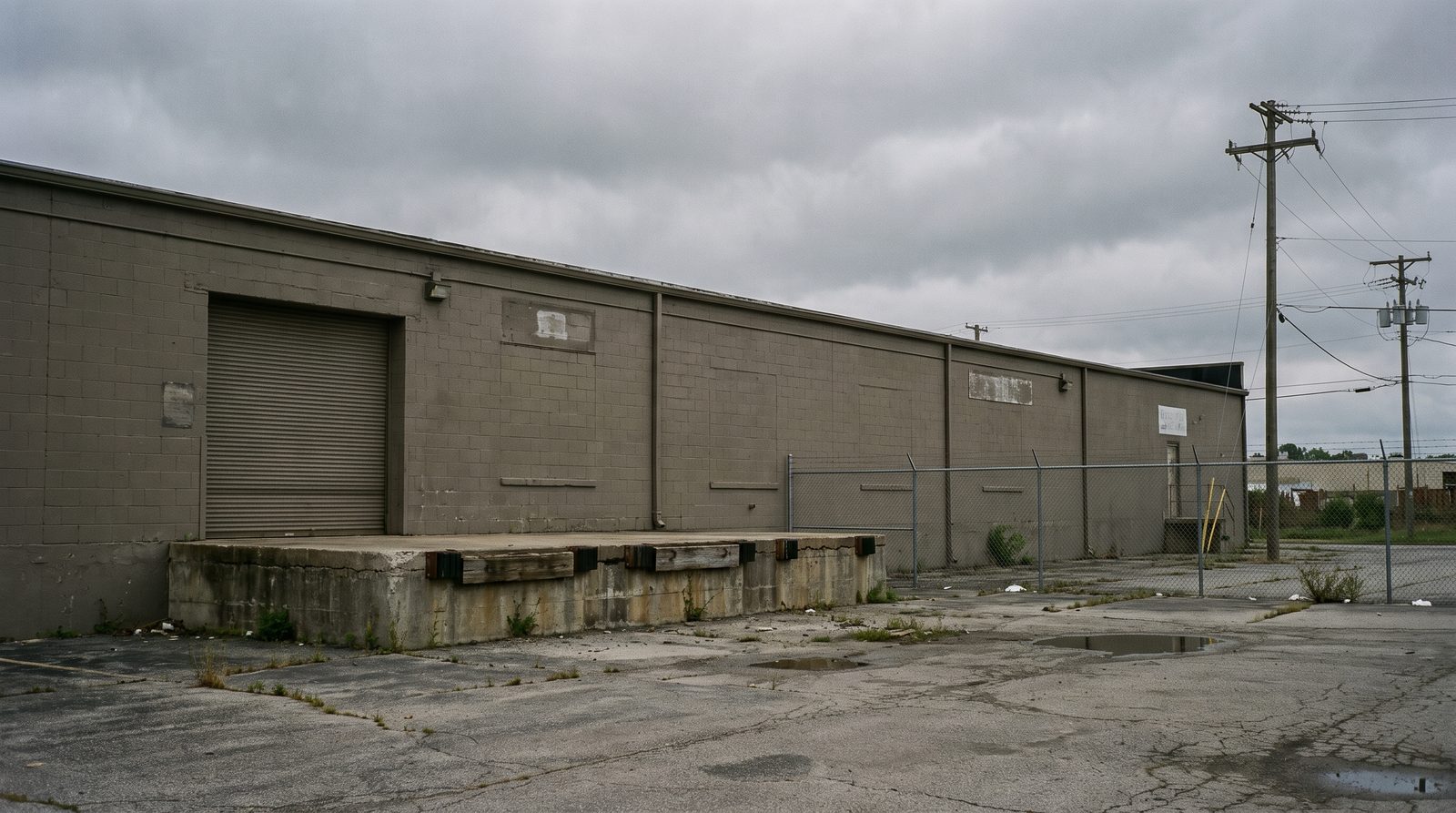 Facility exterior, plain and institutional. Low-drama.